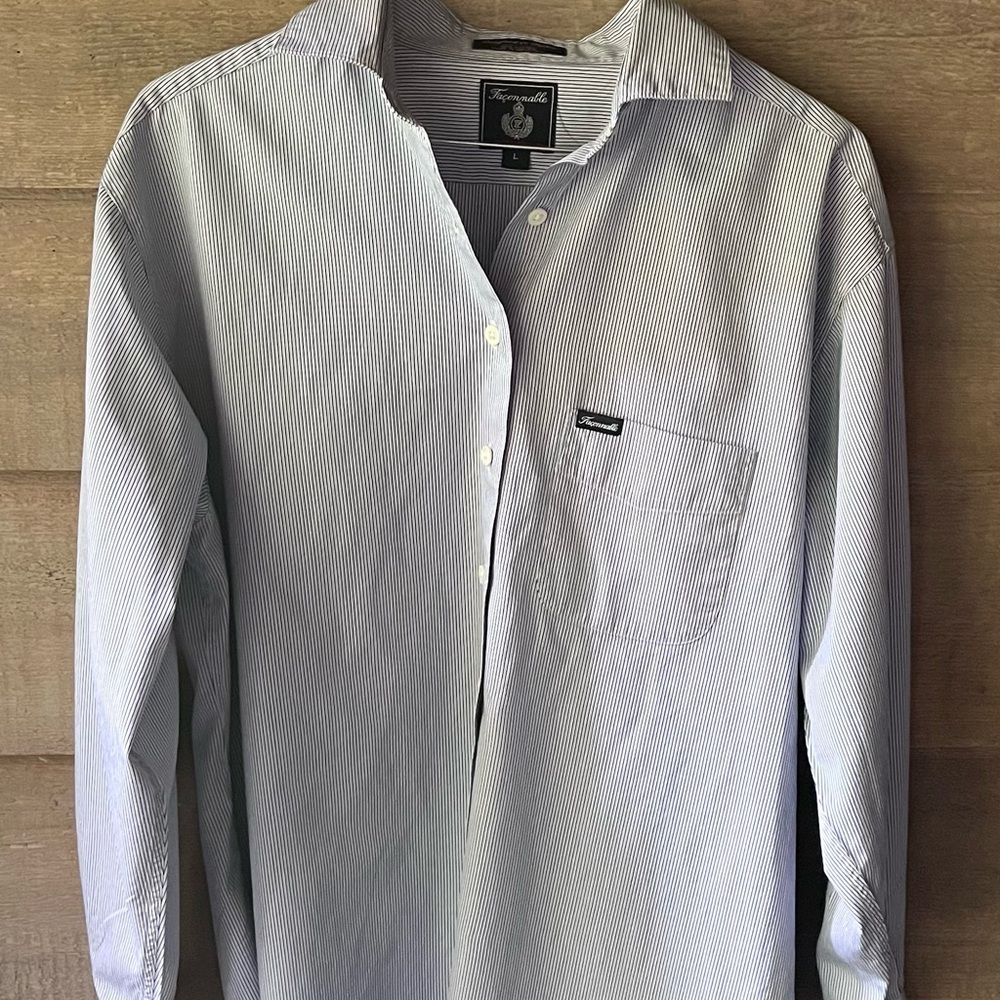 Vintage men’s dress shirt. It was Listed on eBay for $165.